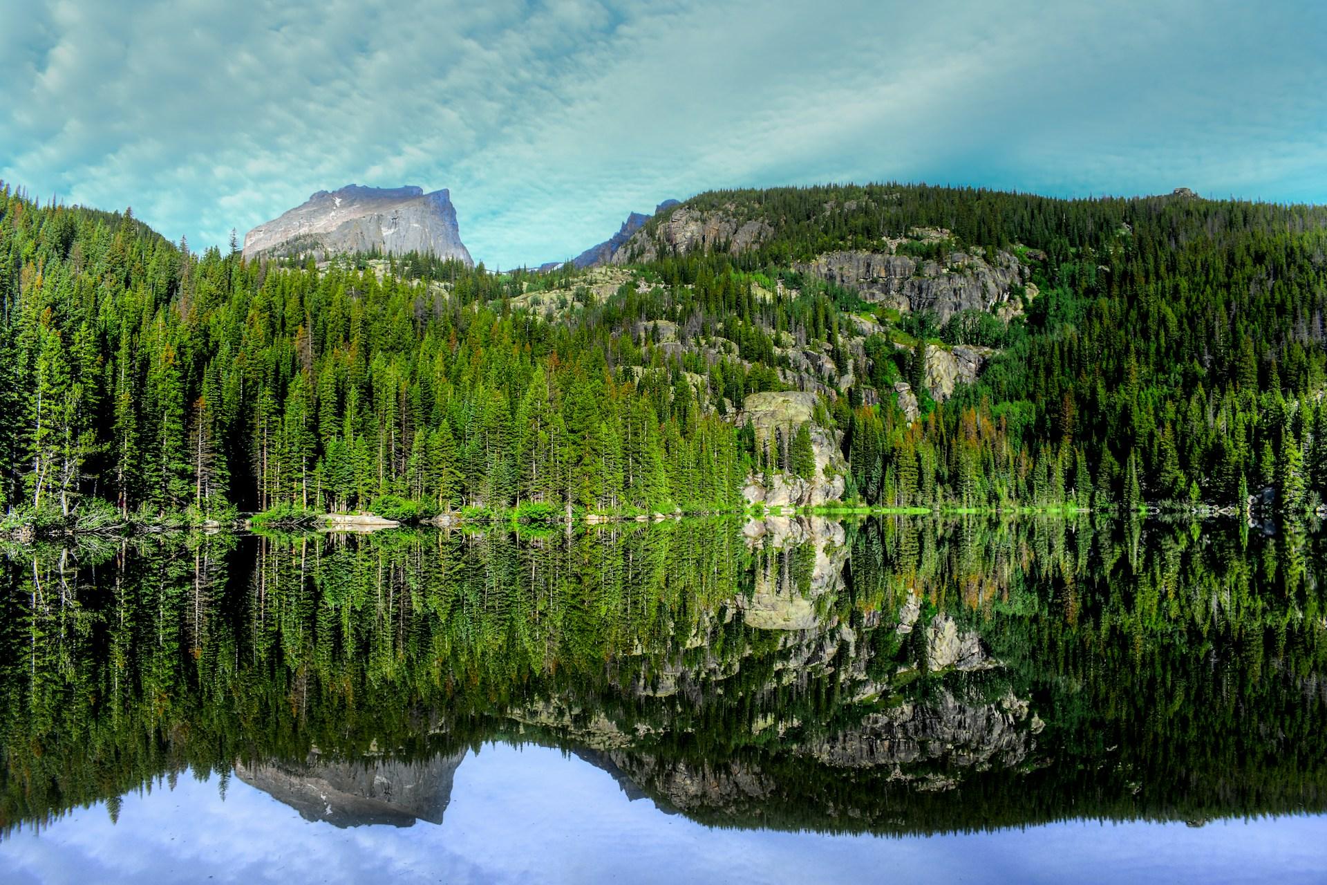 Bear Lake with its spectacular surroundings reflected on the surface of water.
