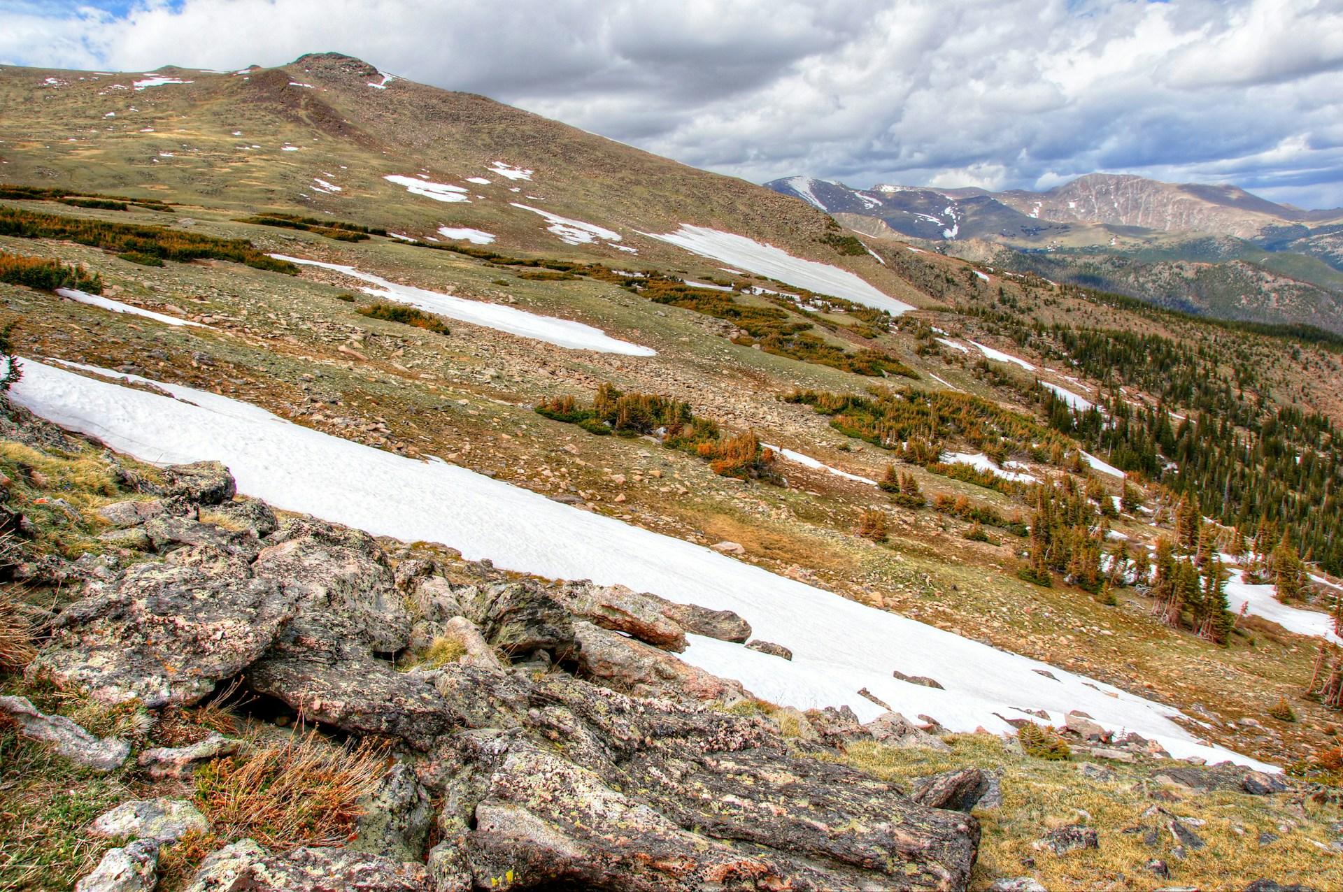 Rocky Mountain's dramatic scenery, covered in snow, as seen from the Trail Ridge Road.
