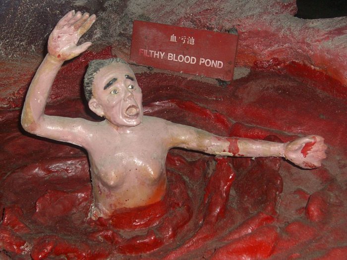 The "filthy blood pond," a gruesome diorama in the Ten Courts of Hell at Haw Par Villa