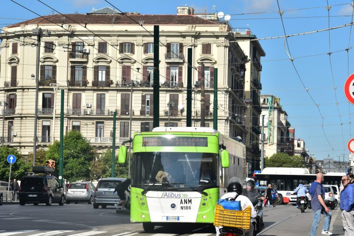 A bus on a road Naples city center