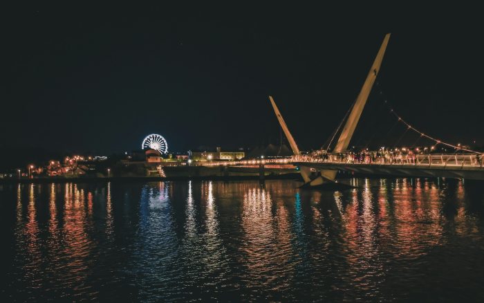 Peace Bridge at night during the Derry Halloween festival.
