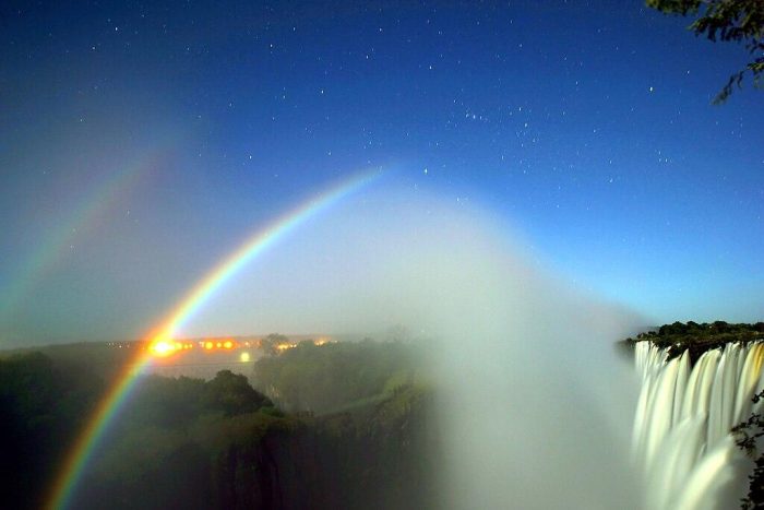 Moonbow, a rare natural phenomena in Victoria Falls