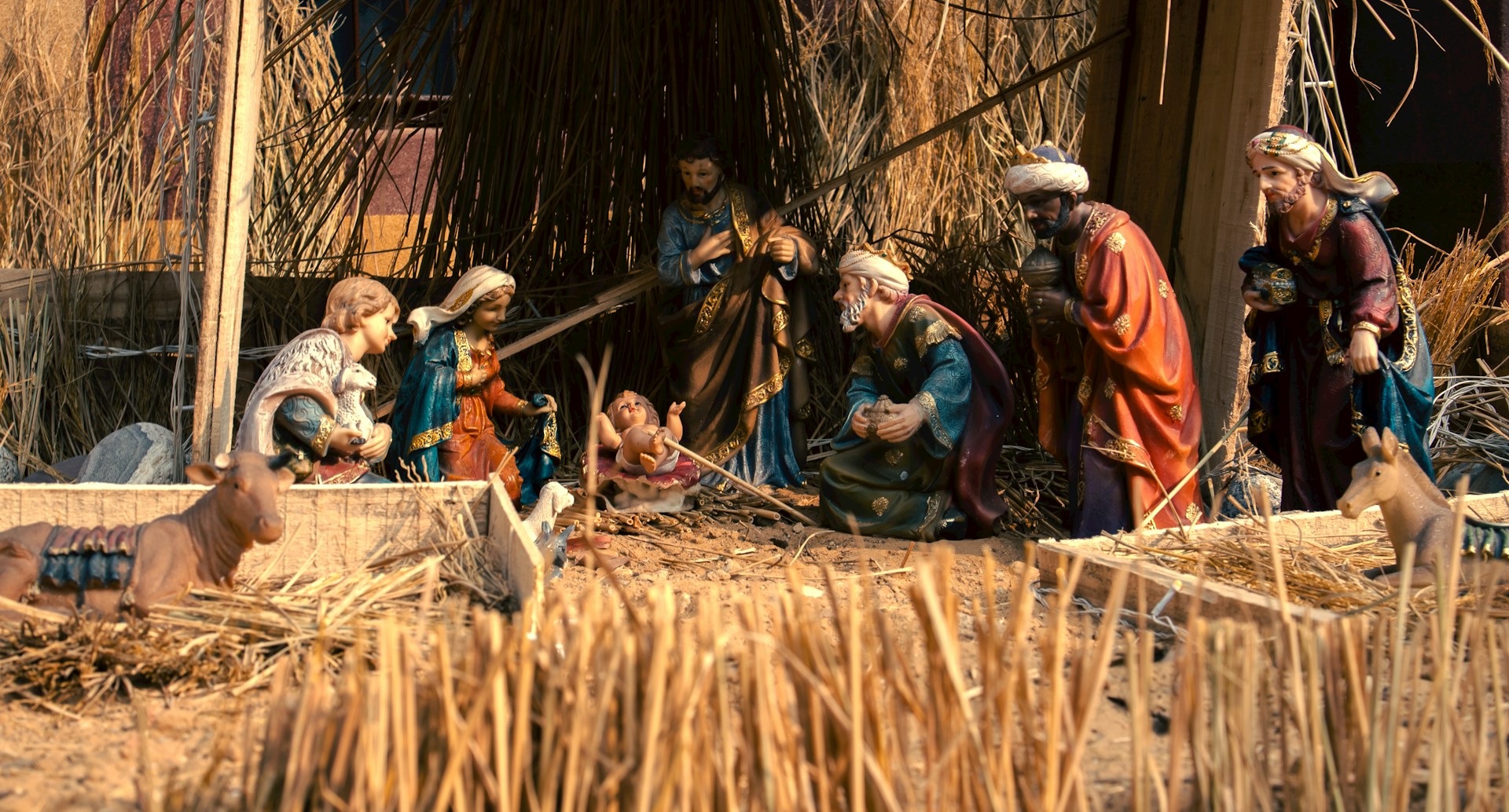 A nativity scene depicting Jesus, Mary, Joseph, and the three wise men in a manger