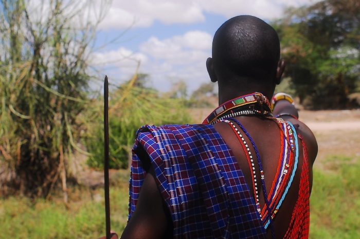 A person wearing a Maasai necklace