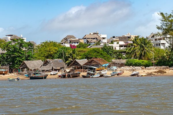 Traditional dhows and Swahili houses along the waterfront of Lamu Island, Kenya
