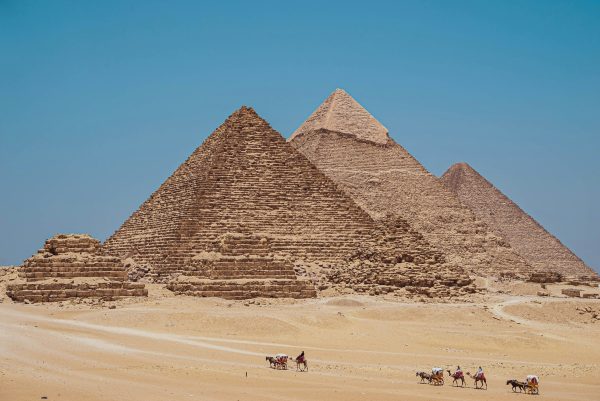 Carmel rides infront of the Pyramids of Giza. Most beautiful places in Africa