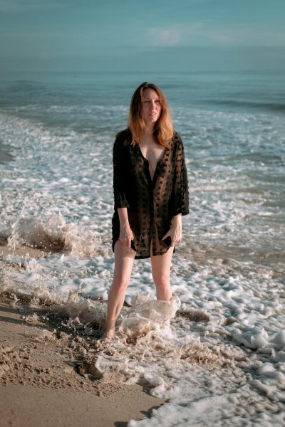 A woman wearing a beach cover-up